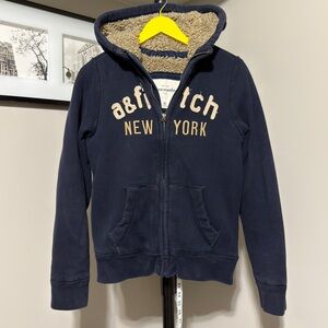 Abercrombie and Fitch, navy blue zip hoodie size small women’s/youth XL